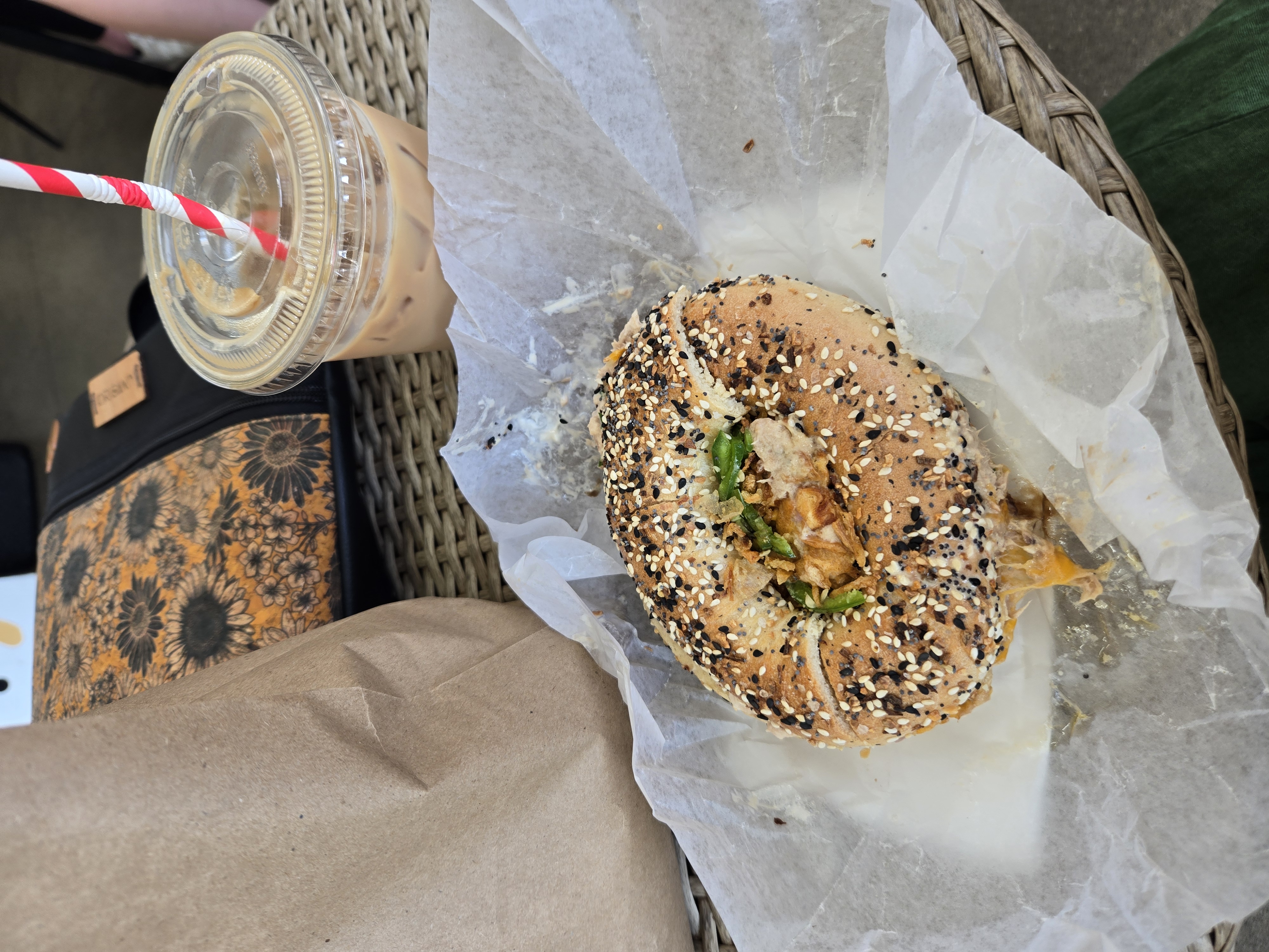 an everything bagel and a coffee