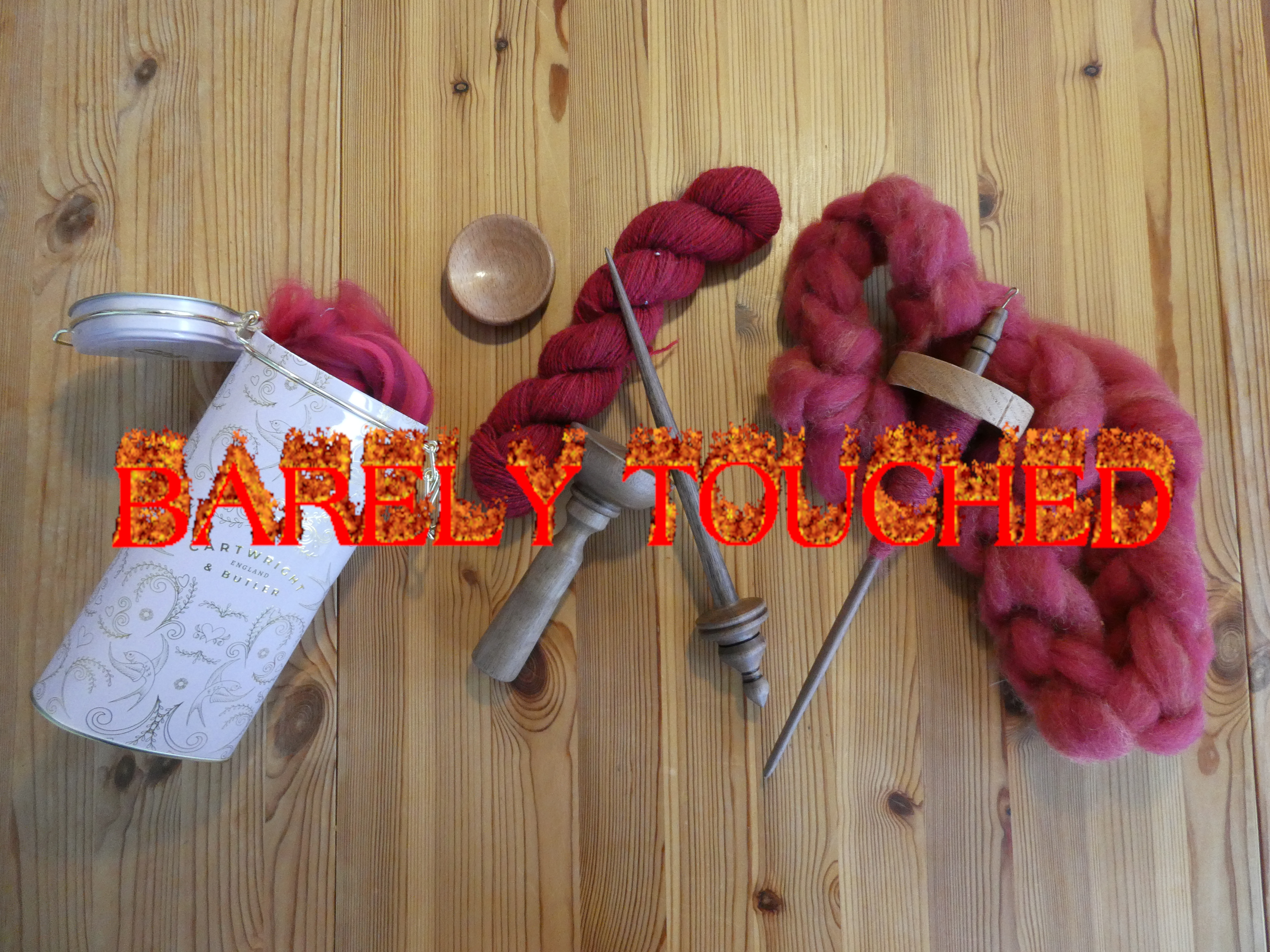 various amount of red/pink fibre and two different spindles (BARELY TOUCHED)